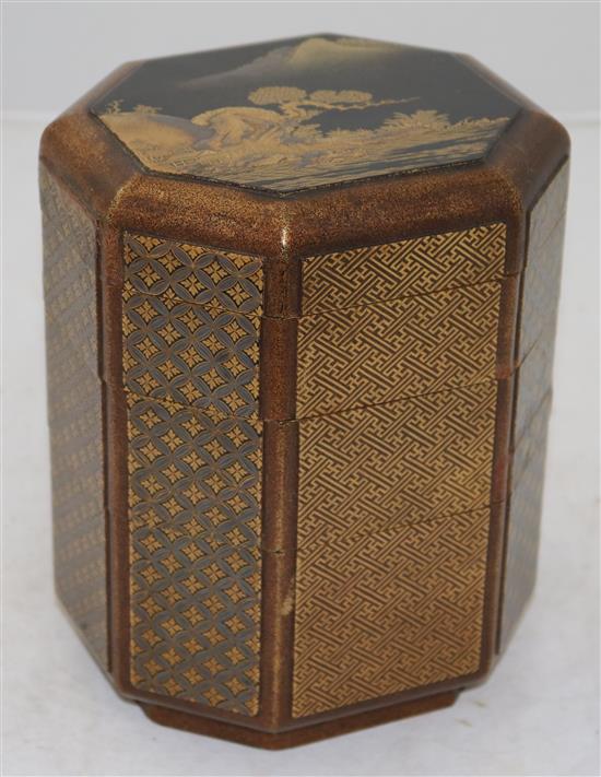 A Japanese togidashi gold lacquer jubako three tier box and cover, 18th century, 19.5cm, restorations